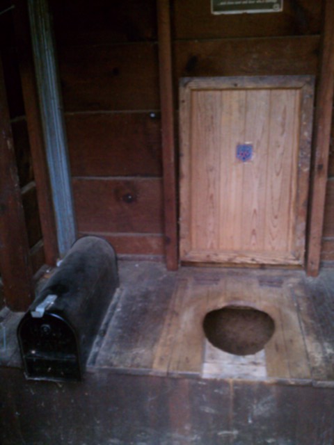 yes that is a super bowl XXV sticker on the underside of this rustic privy lid yes that is a super bowl XXV sticker on the underside of this rustic privy lid